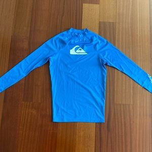 Quiksilver Men’s Long-sleeve Rashguard in bright blue, size small. New, NO tags.